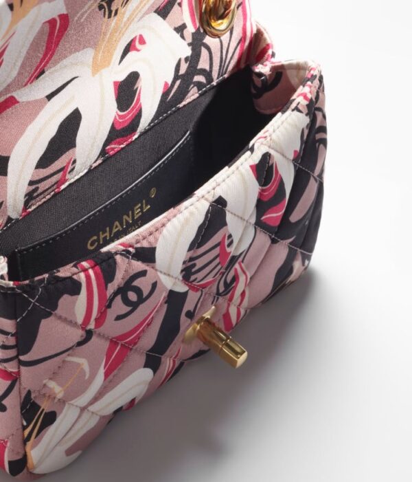 Chanel's MINI FLAP BAG with a floral print.