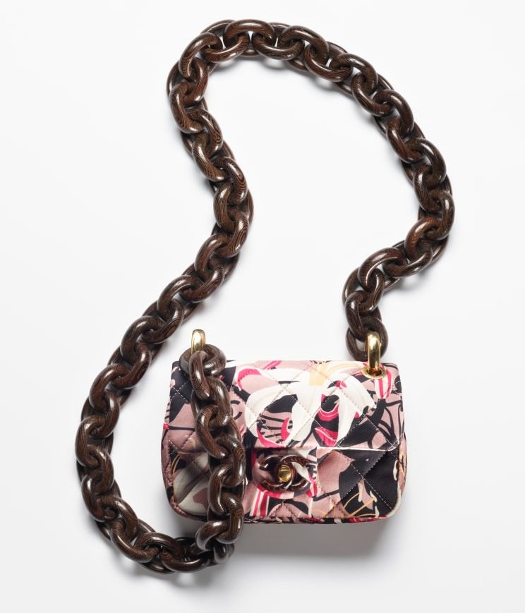 Chanel's MINI FLAP BAG with a floral print.